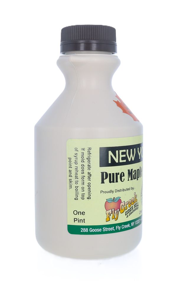 Bottle of New York Pure Maple syrup with a label on a white background